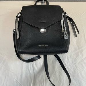 Michael Kors black backpack.